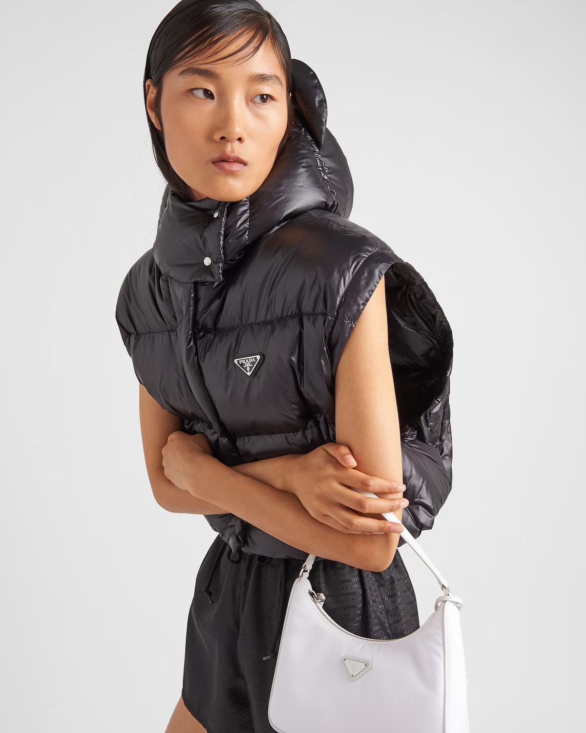 Prada Womens Black Logo-plaque Padded Cropped Shell-down Jacket In Black