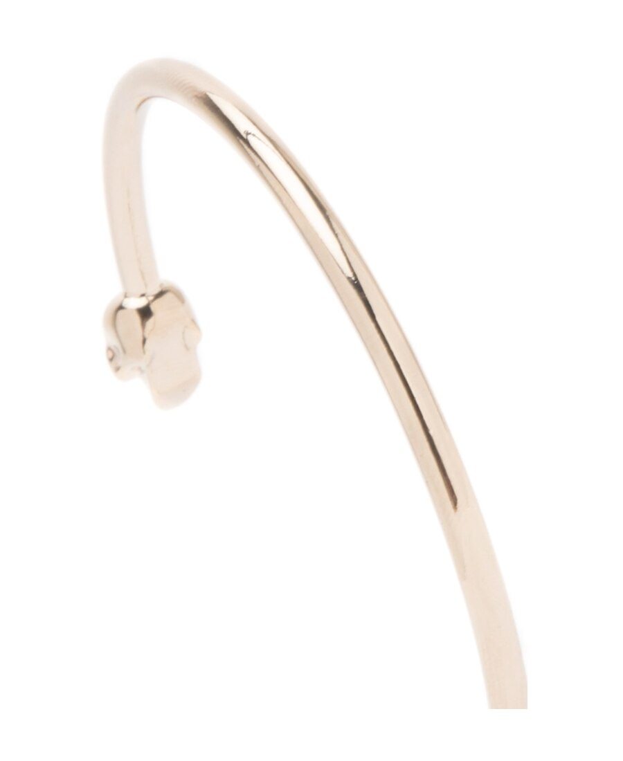 Alexander Mcqueen Twin Skull Bracelet In Yellow