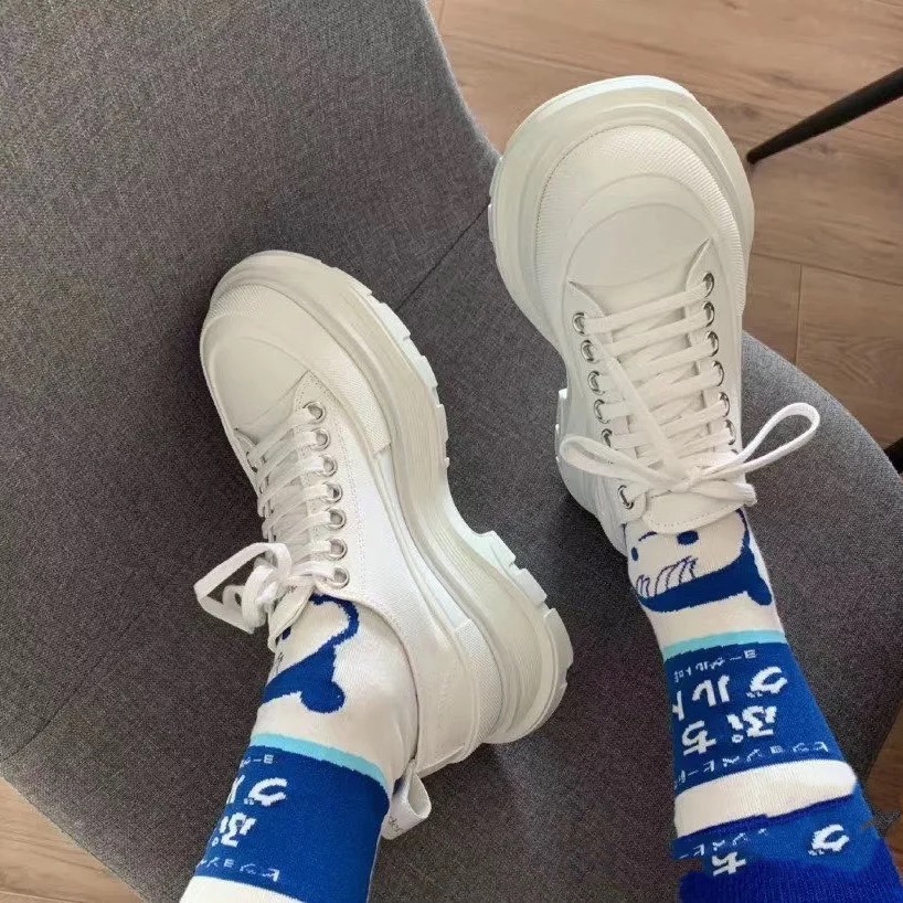Shop Alexander Mcqueen Tread Slick Low-top Sneakers In White