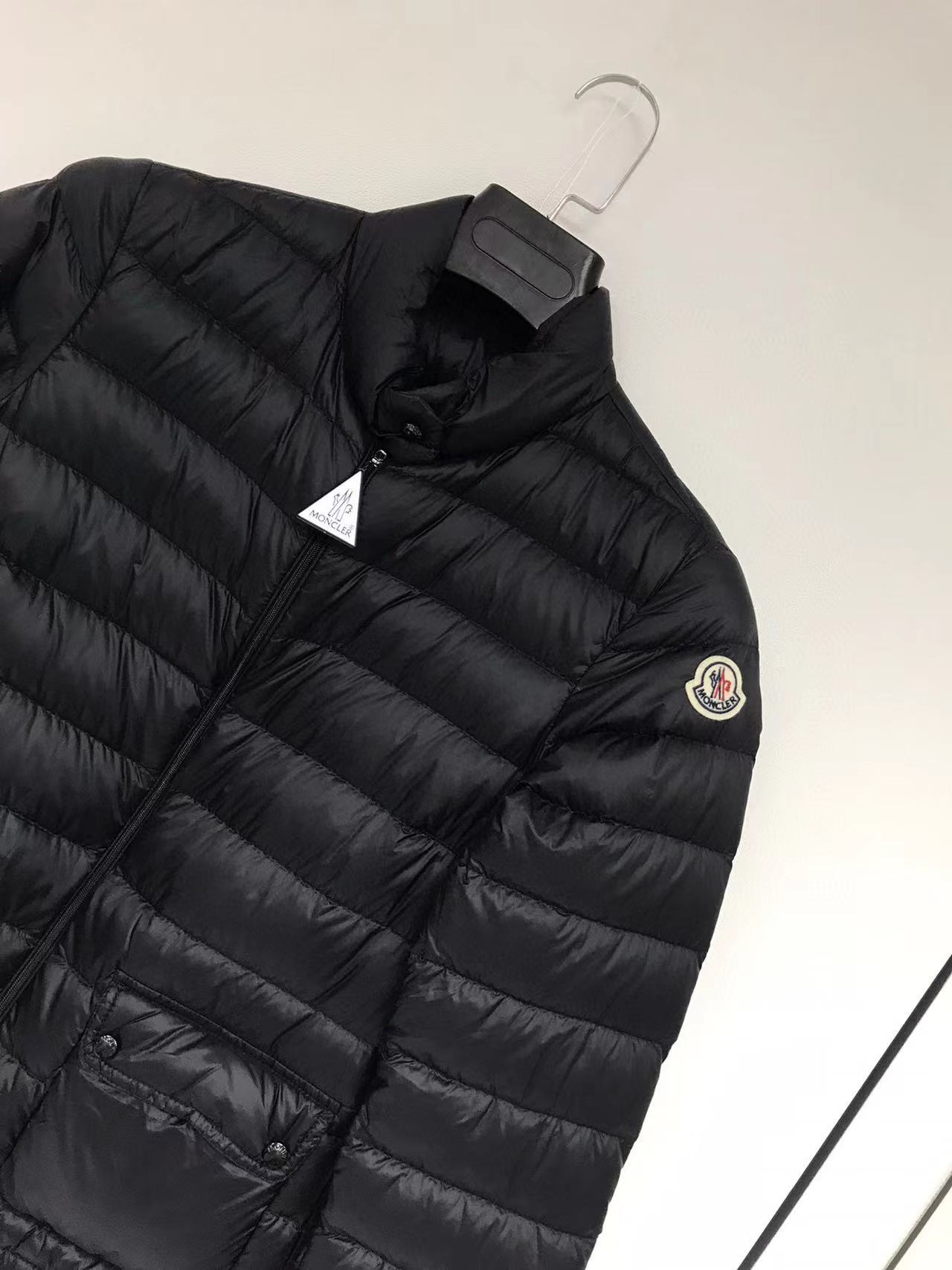 Moncler Lans Down Jacket With Pockets On The Front In Black