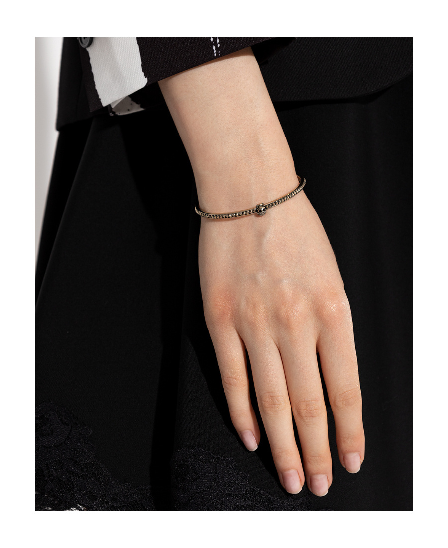 Alexander Mcqueen Skull Charm Cuff Bracelet In Yellow