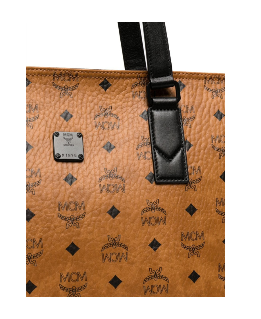 Mcm Logo Printed Handbag In Brown