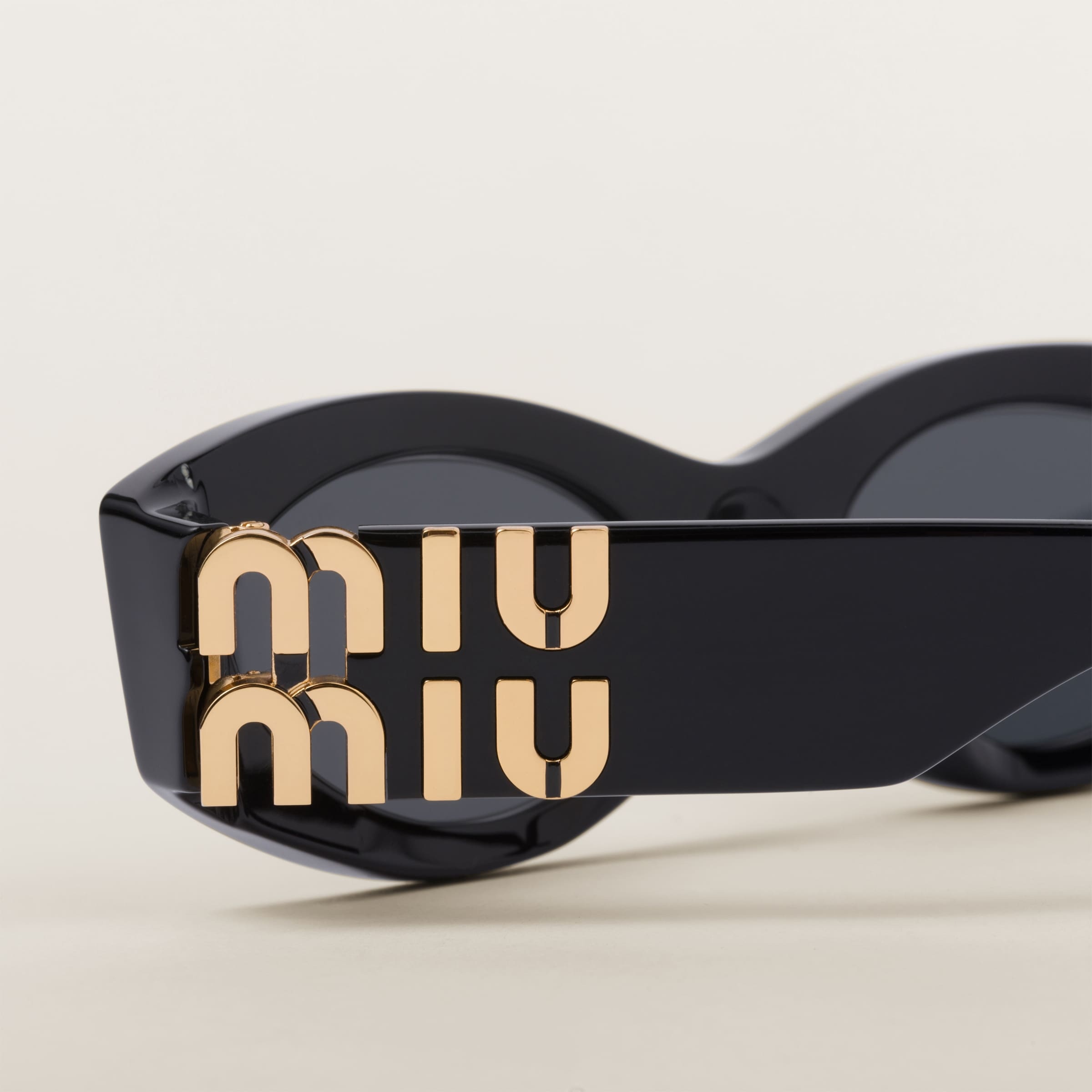 Miu Miu Cat-eye Sunglasses In Gray