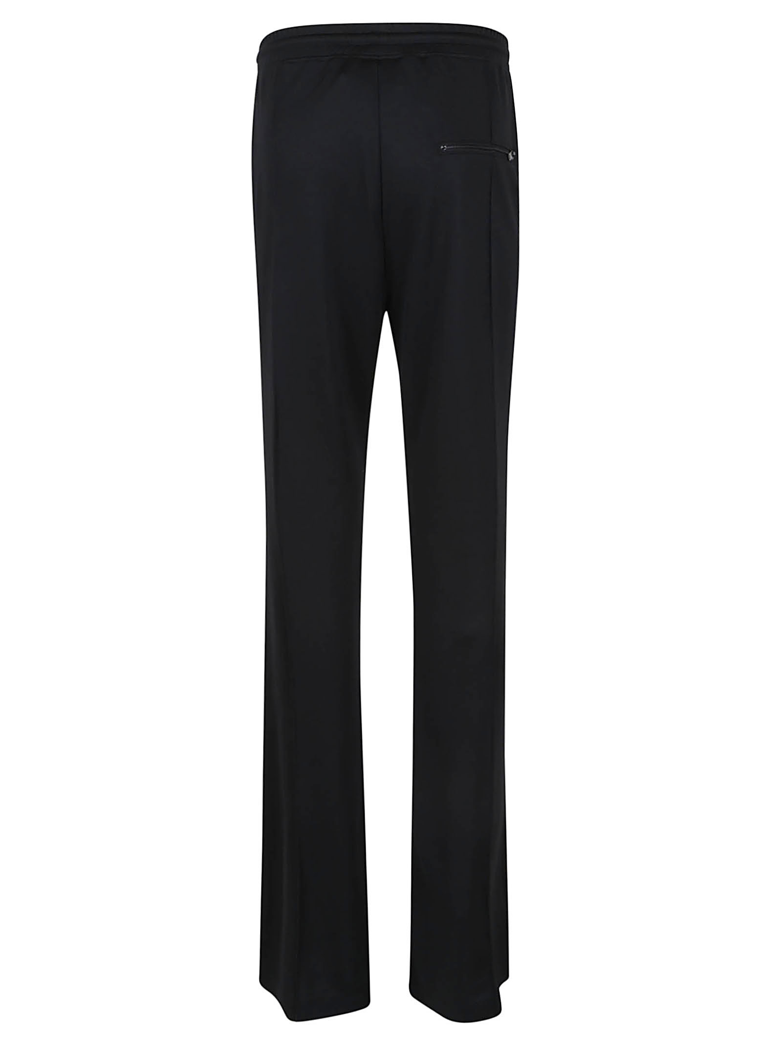 Shop Courrèges Logo-embroidered Flared Trousers In Black
