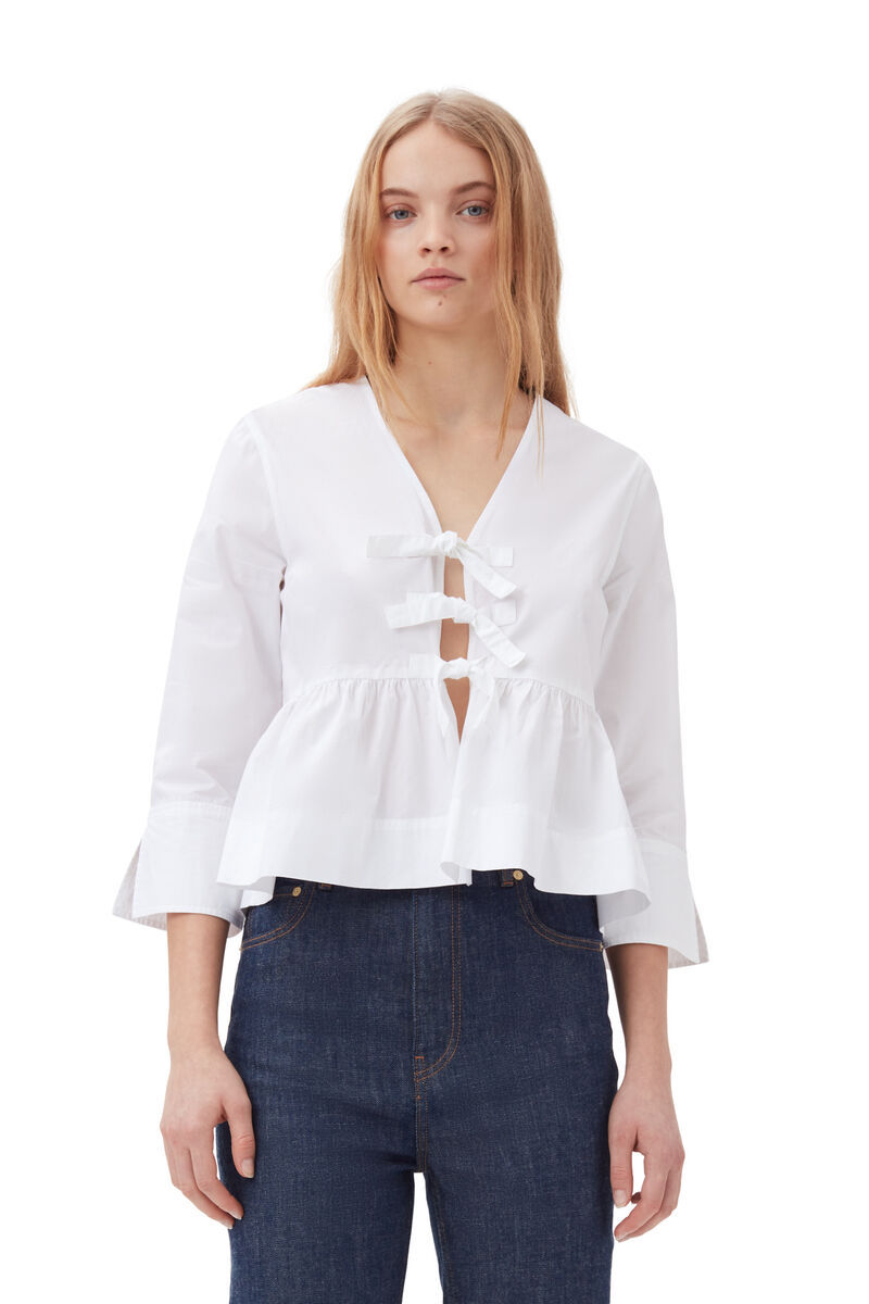 Ganni Bow-detailed Cotton-poplin Peplum Blouse In White