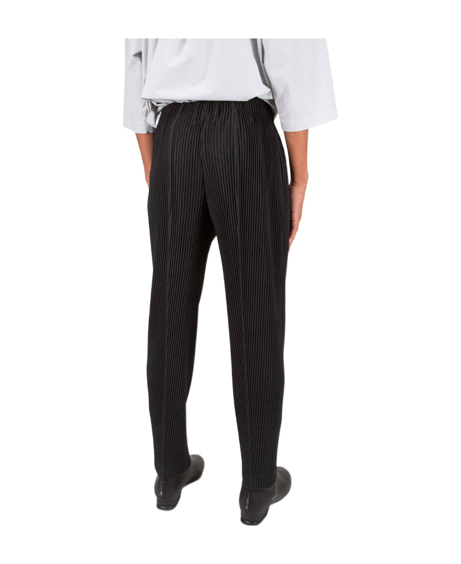 Issey Miyake Tapered Plisse Trousers In Black