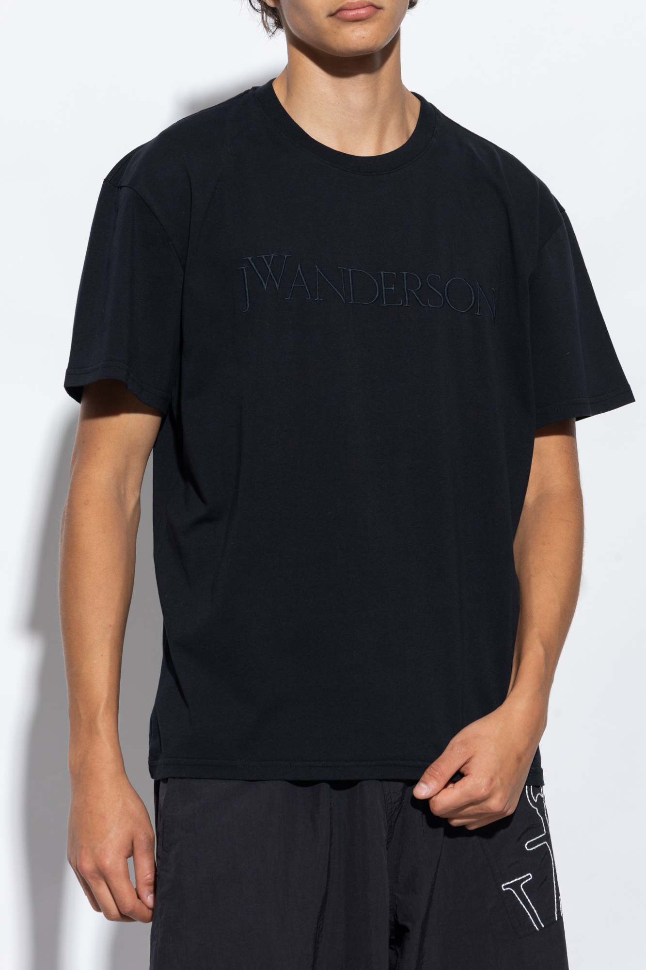 Jw Anderson Logo Embroidered Short-sleeved T-shirt In Black
