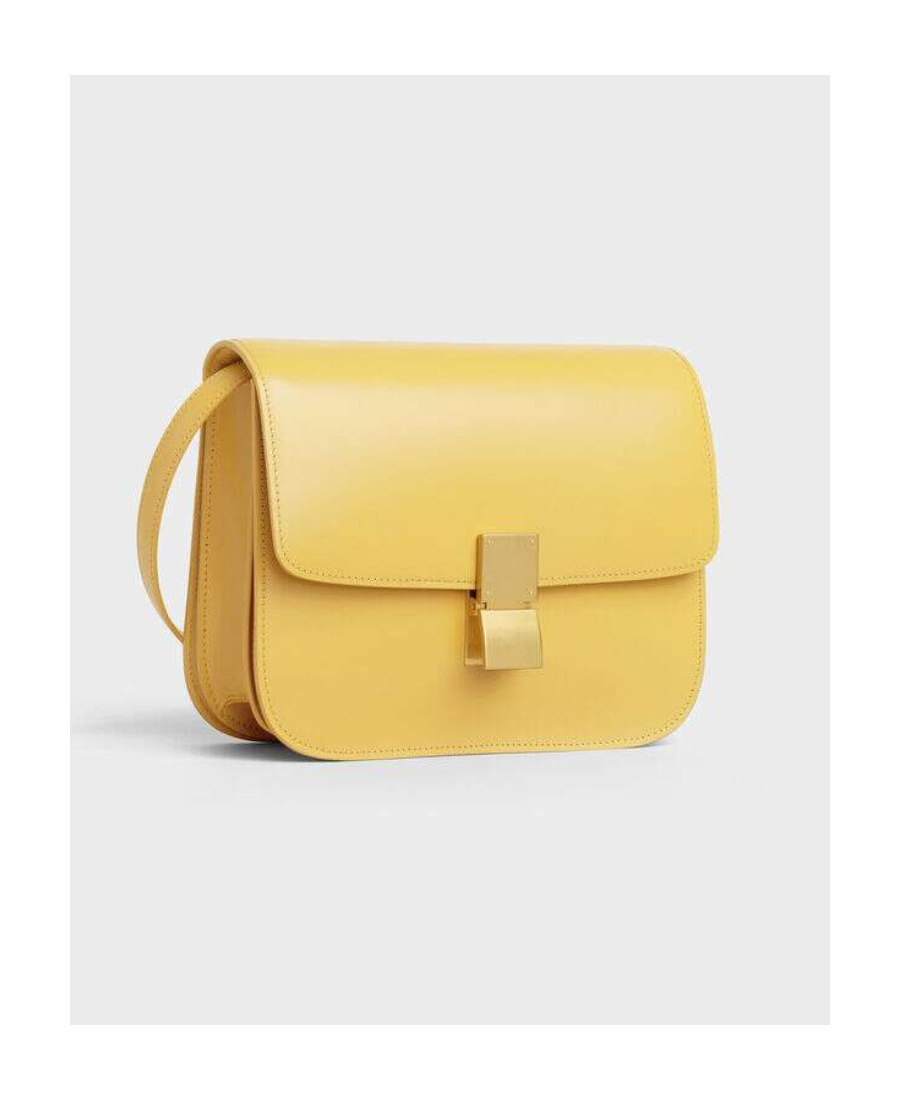 Celine Classic Medium Cow Leather Polished Handbag In Yellow
