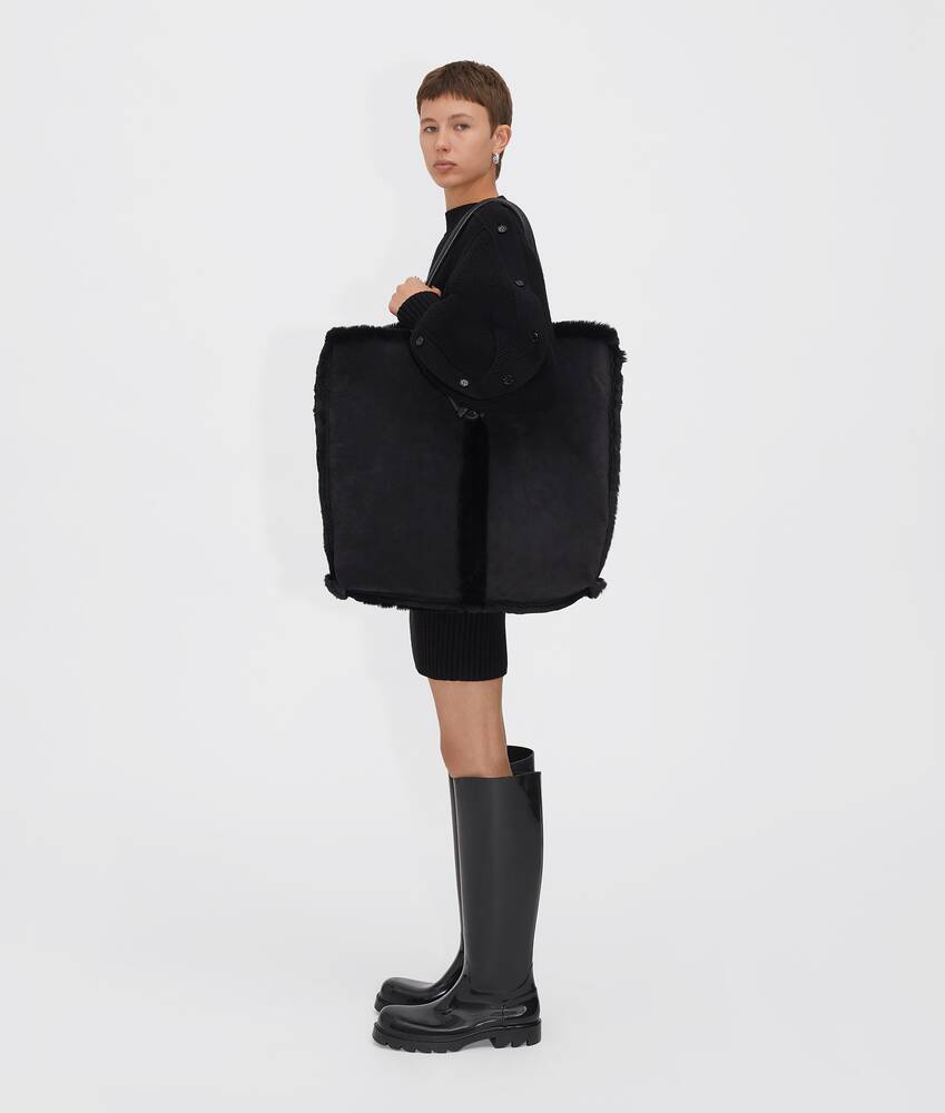 Bottega Veneta Bolster Reversible Shearling Suede Bag In Black