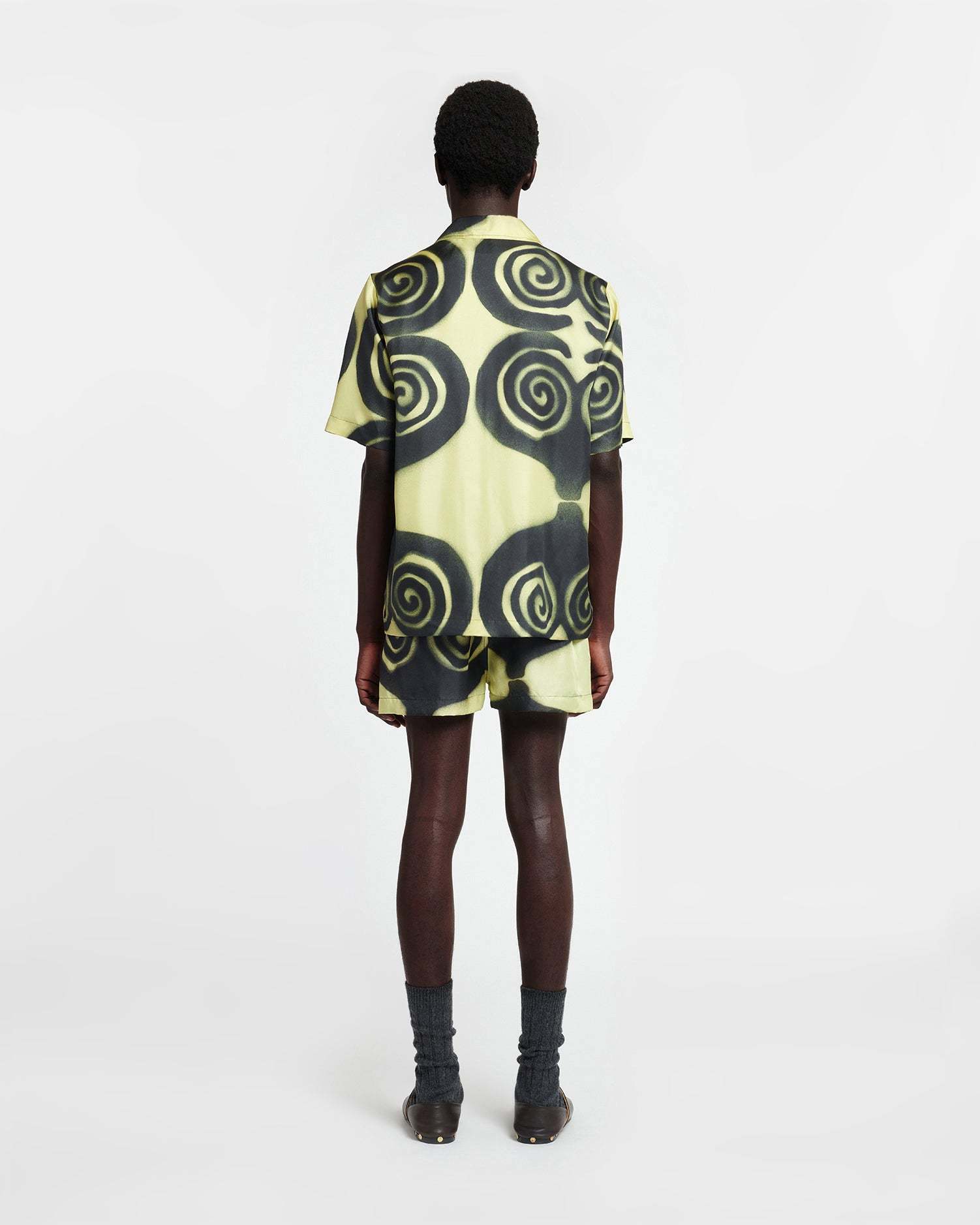 Nanushka Amil Spiral-print Silk Shorts In Black