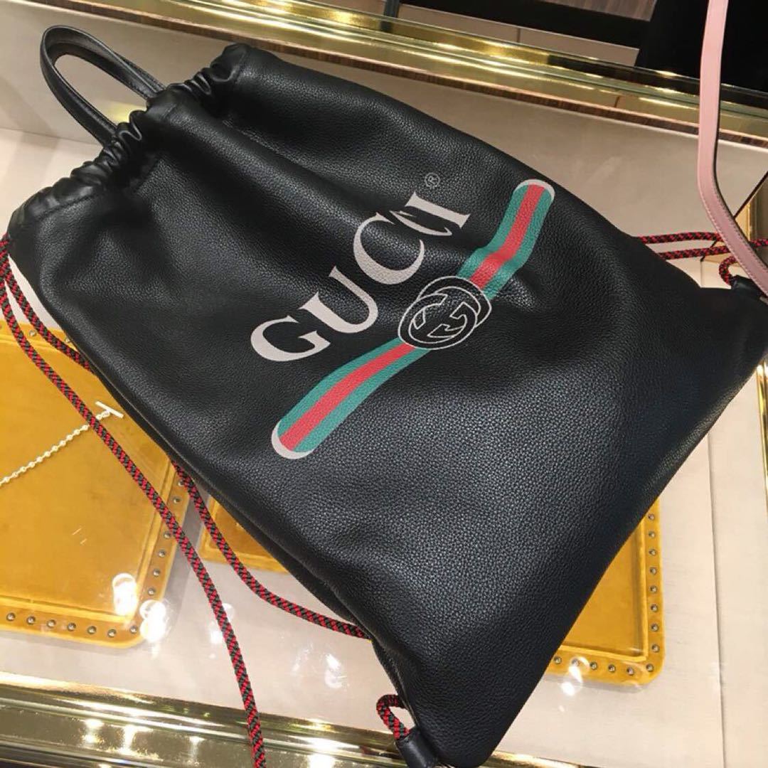 Gucci Logo Drawstring Backpack In Black