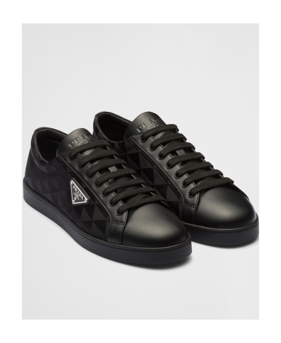 Shop Prada Leather And Nylon Sneakers In Black