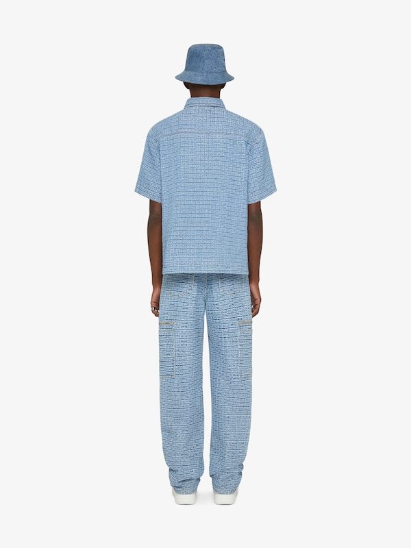 Givenchy 4g-embossed Logo-plaque Wide-leg Jeans In Blue