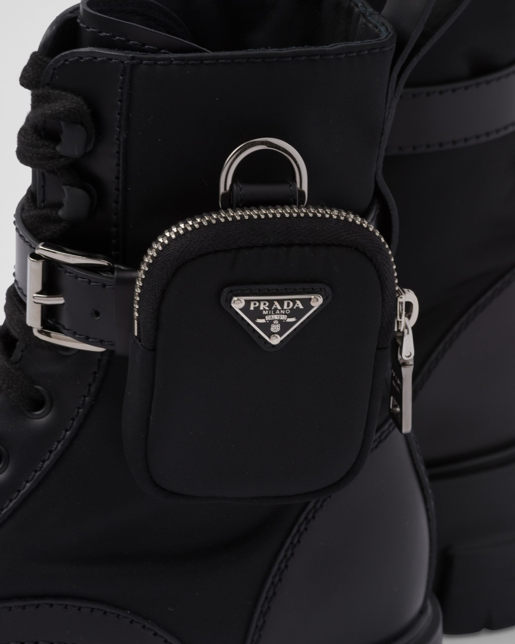 Prada Monolith Brushed Leather And Nylon Boots In Black