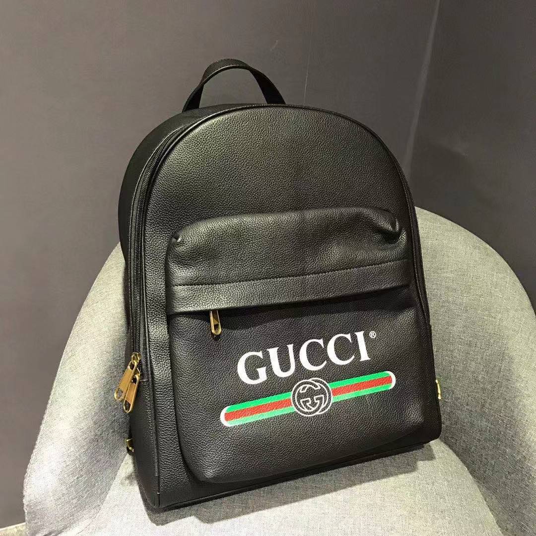 GUCCI GUCCI PRINT LEATHER BACKPACK 