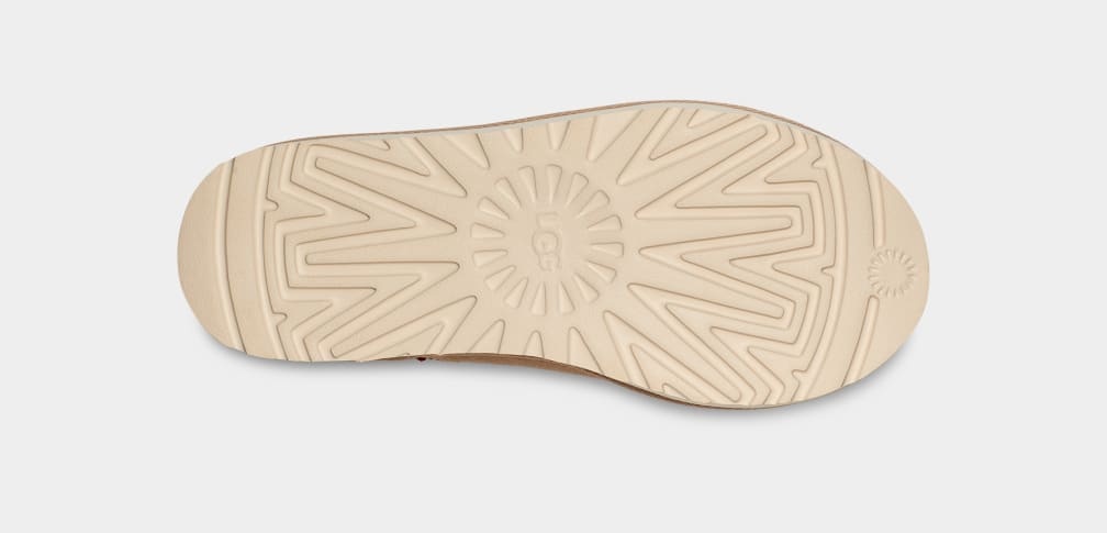 Shop Ugg Tasman Logo Embossed Slippers In Nude