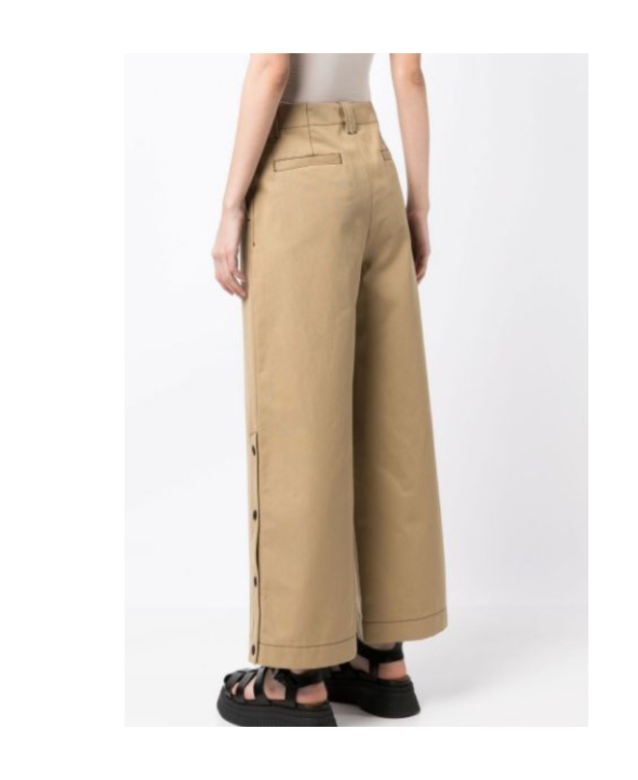 Shop Msgm High-waisted Buttoned Cropped Trousers In Nude