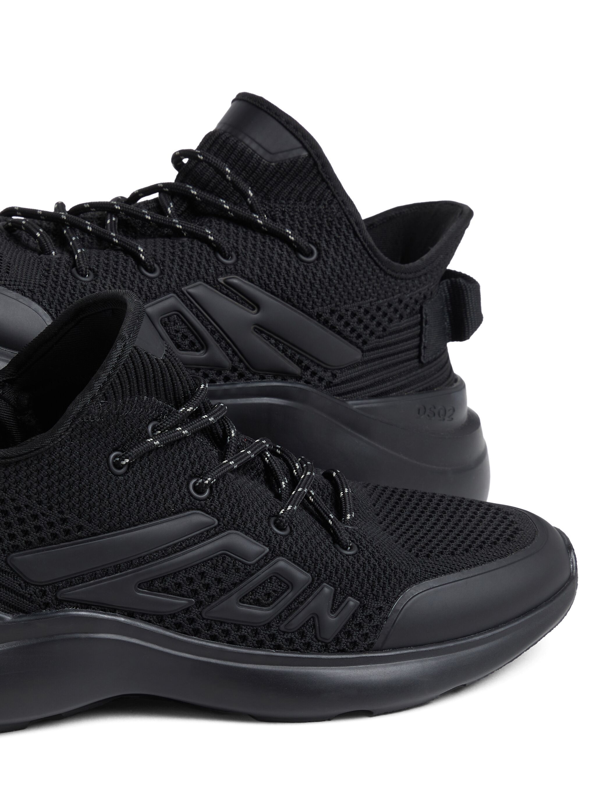 Shop Dsquared2 Embossed-logo Sneakers In Black