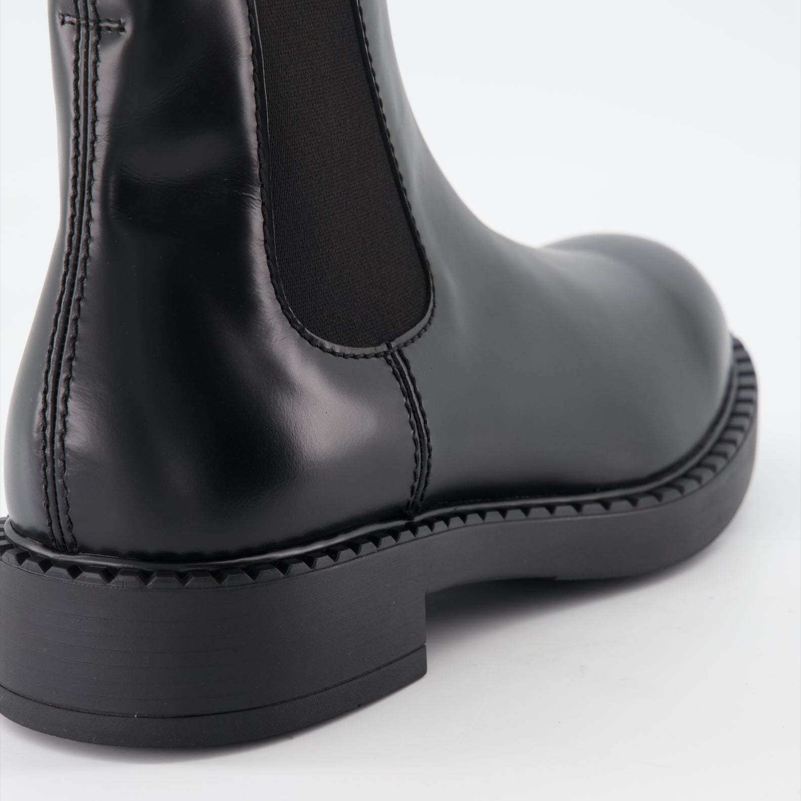 Prada Round Head Boots In Black