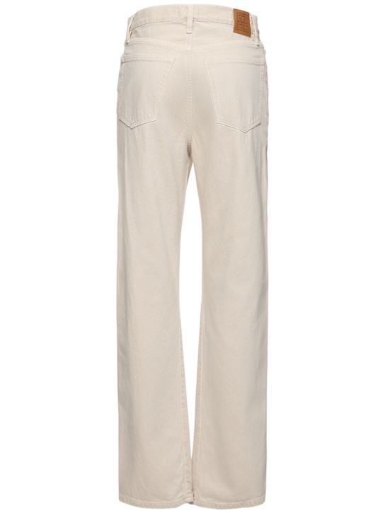 Shop Totême Twisted Seam Mid Rise Denim Jeans