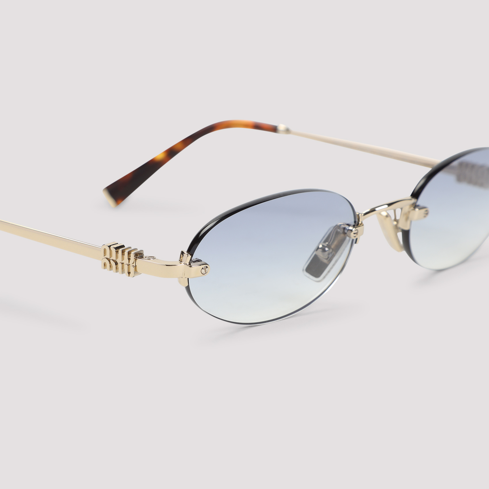 Miu Miu Frameless Sunglasses In Gray