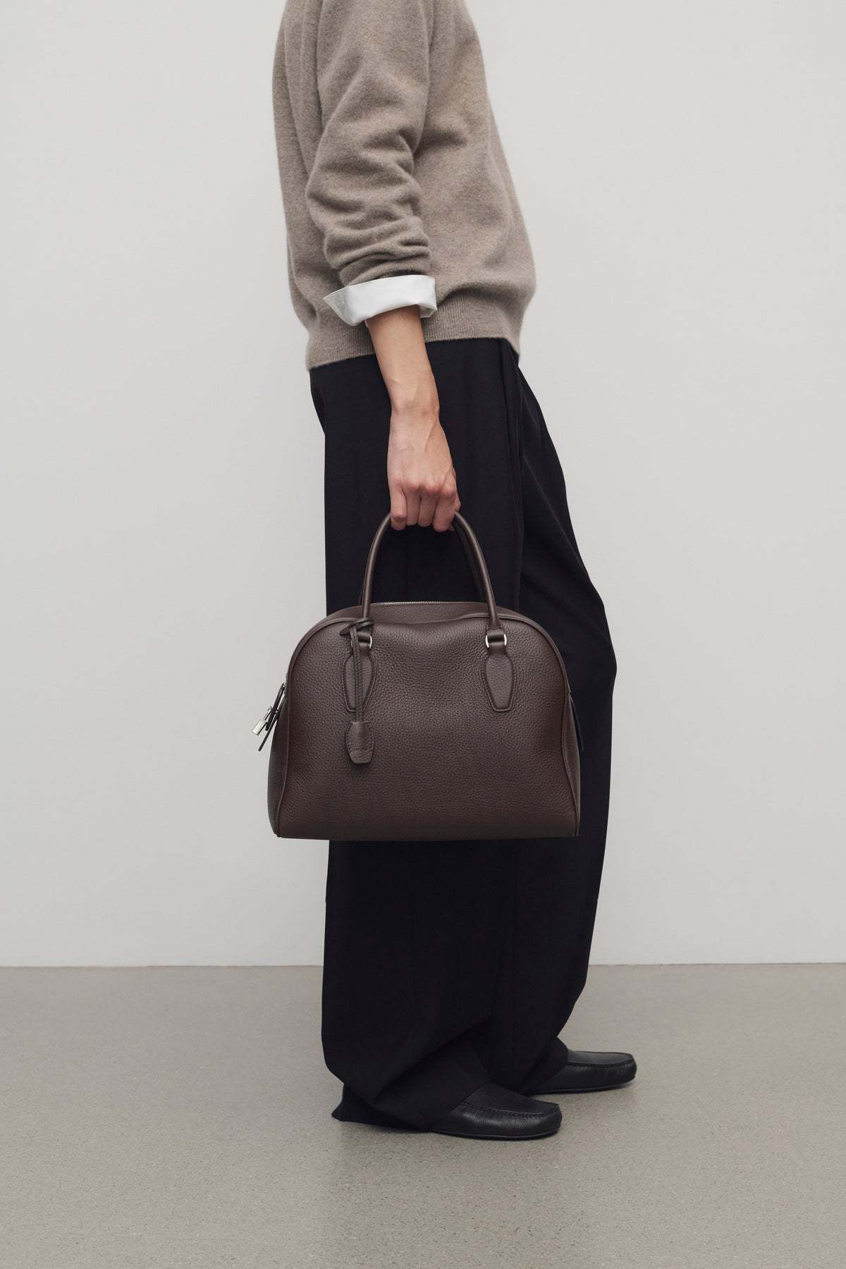 The Row Zipper Handbag In Brown