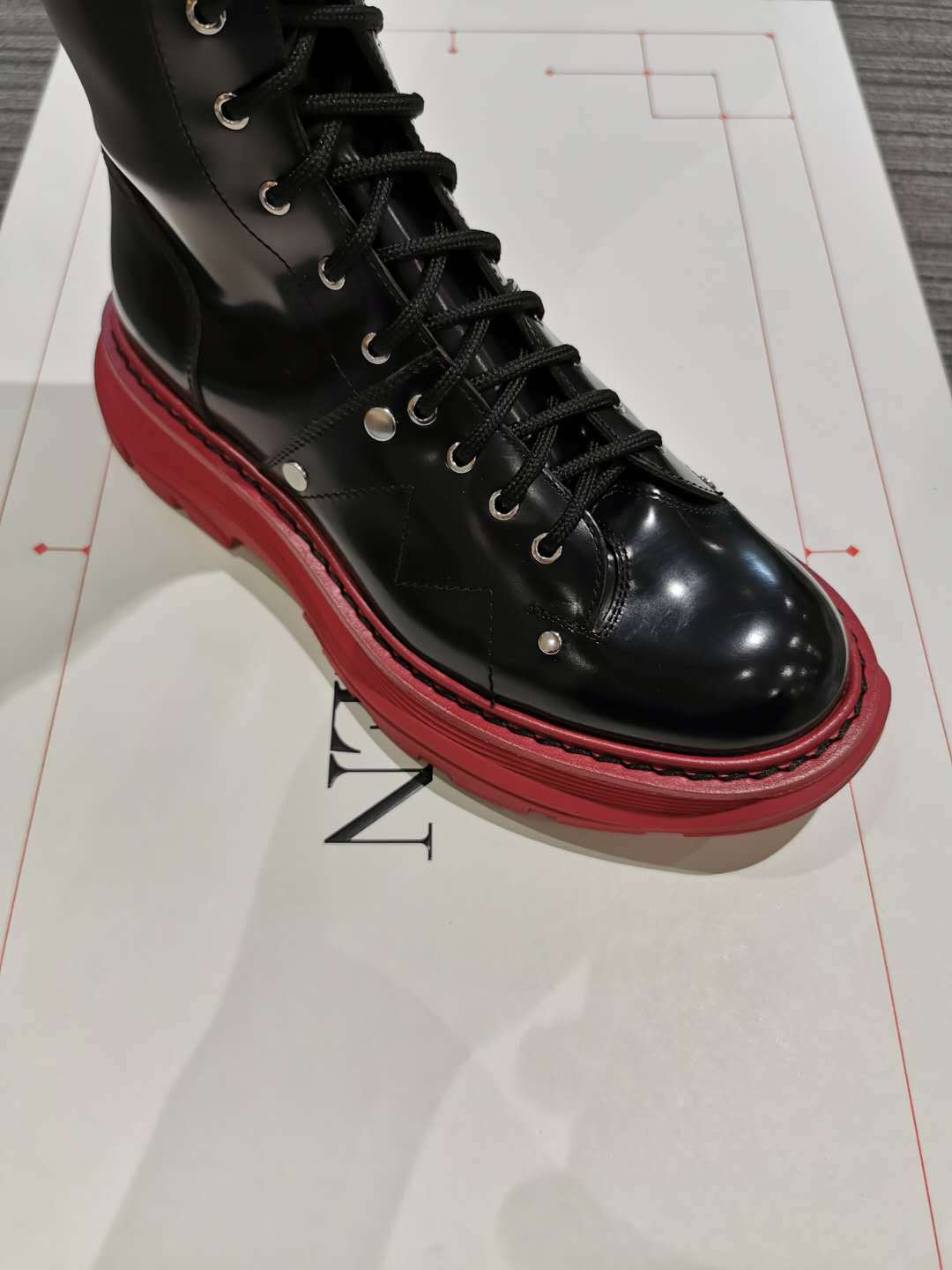 Alexander Mcqueen Leather And Knee Boots In Black