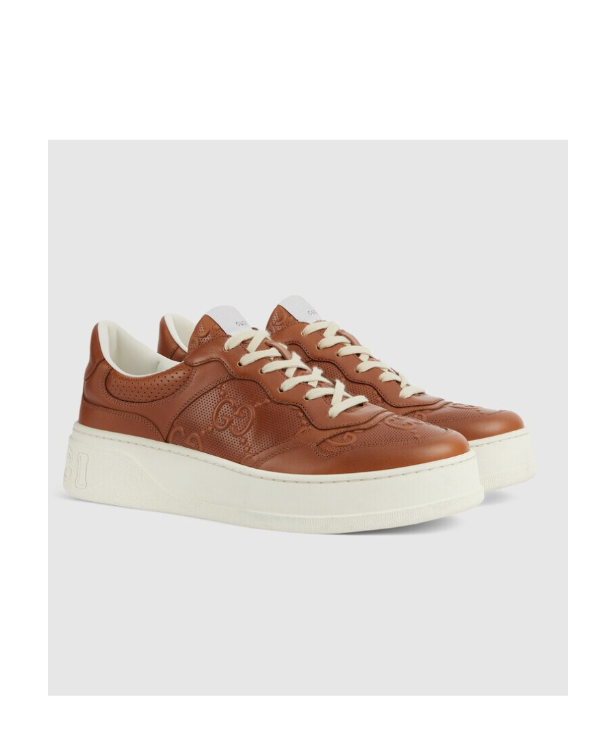 Gucci Gg Embossed-logo Sneakers In Brown