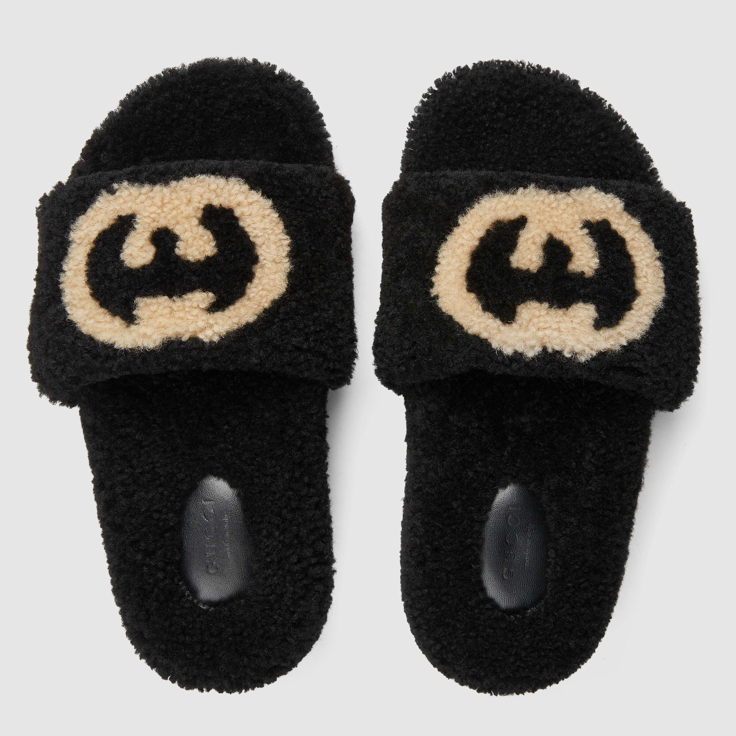 Gucci Interlocking G Shearling Slides In Black