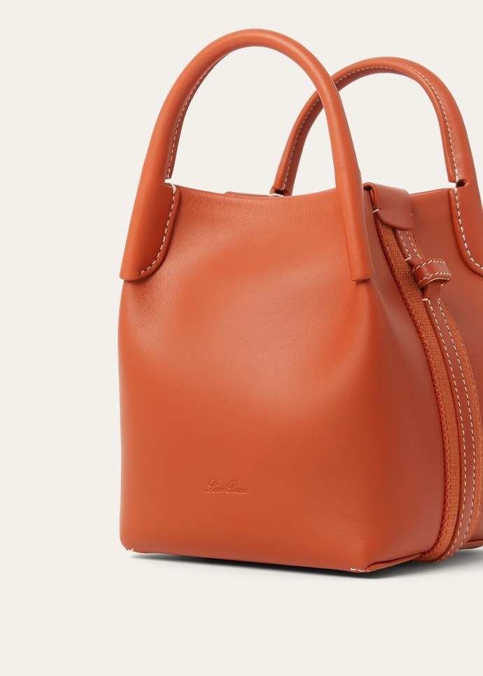 Loro Piana Bale Micro Rounded Leather Top-handle Bag In Orange