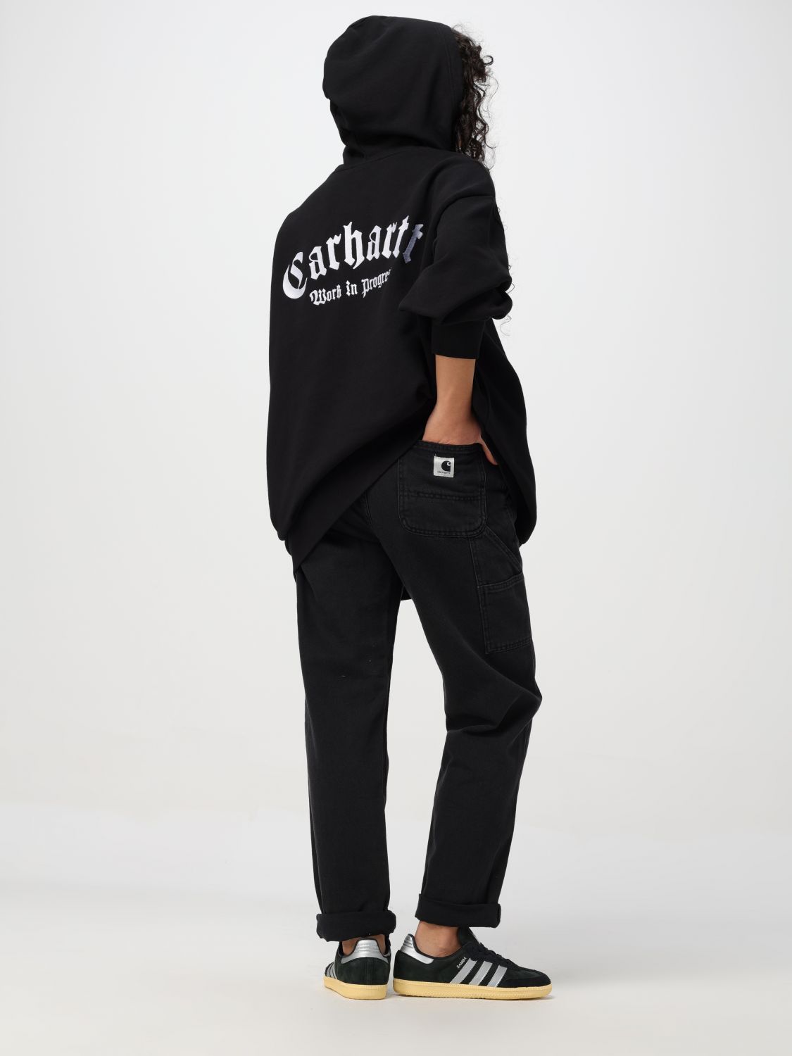 Shop Carhartt Mid-rise Tapered-leg Jeans In Black
