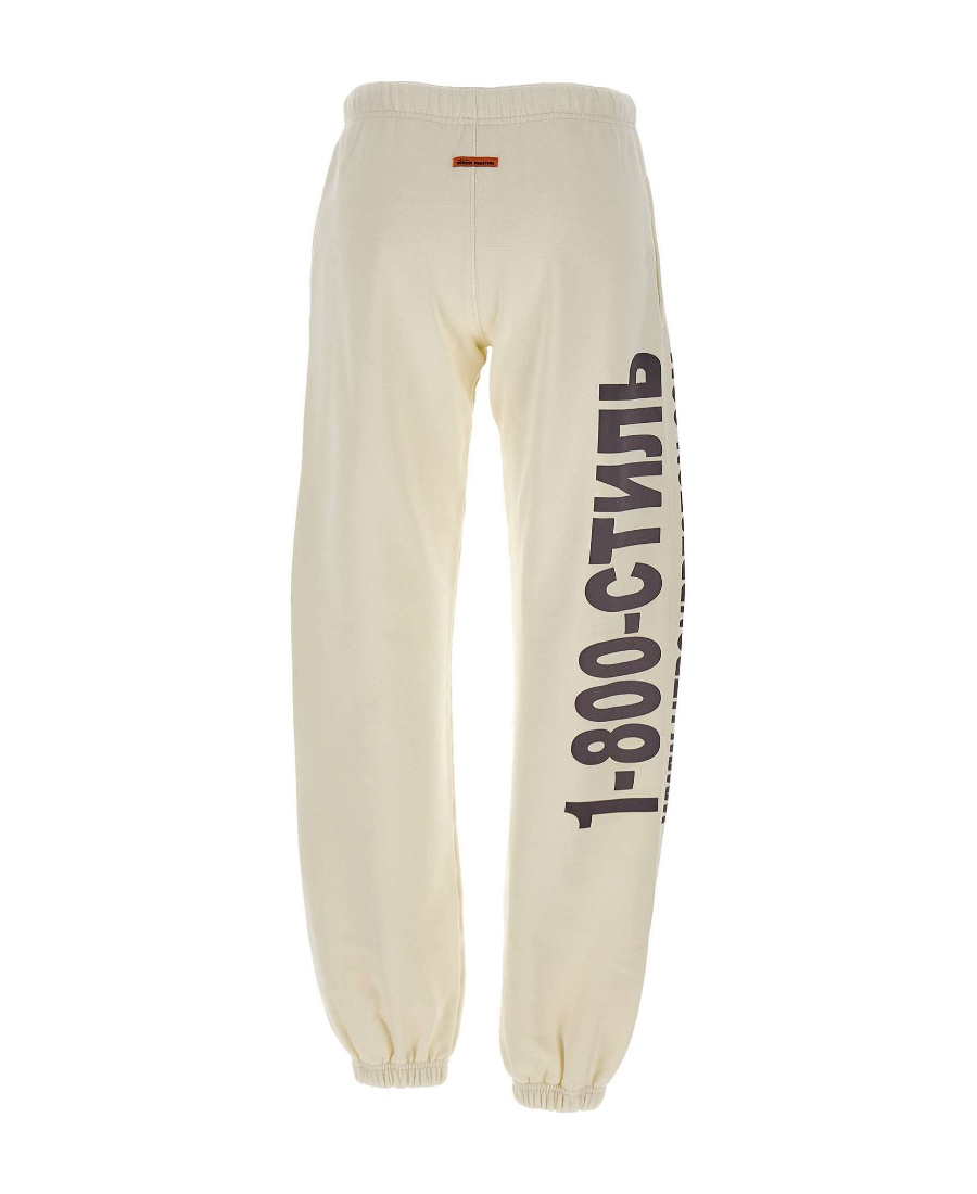 Shop Heron Preston Real Estate Slogan Printed Track Pants In Nude