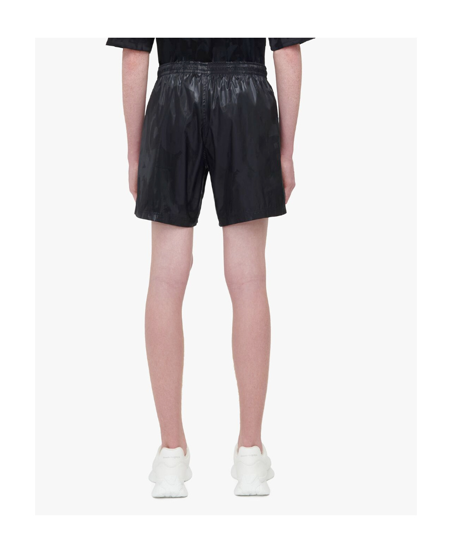 Alexander Mcqueen Solid Color Swim Shorts With Graffiti Print In Black
