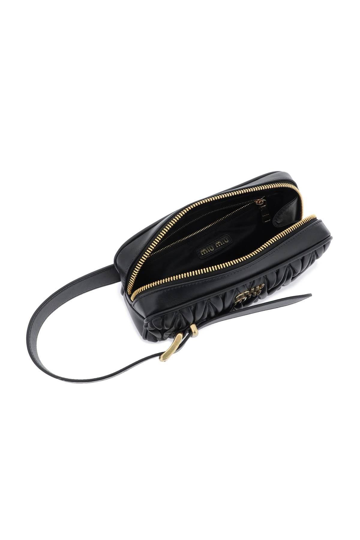 Miu Miu Woman Black Leather Clutch In Black