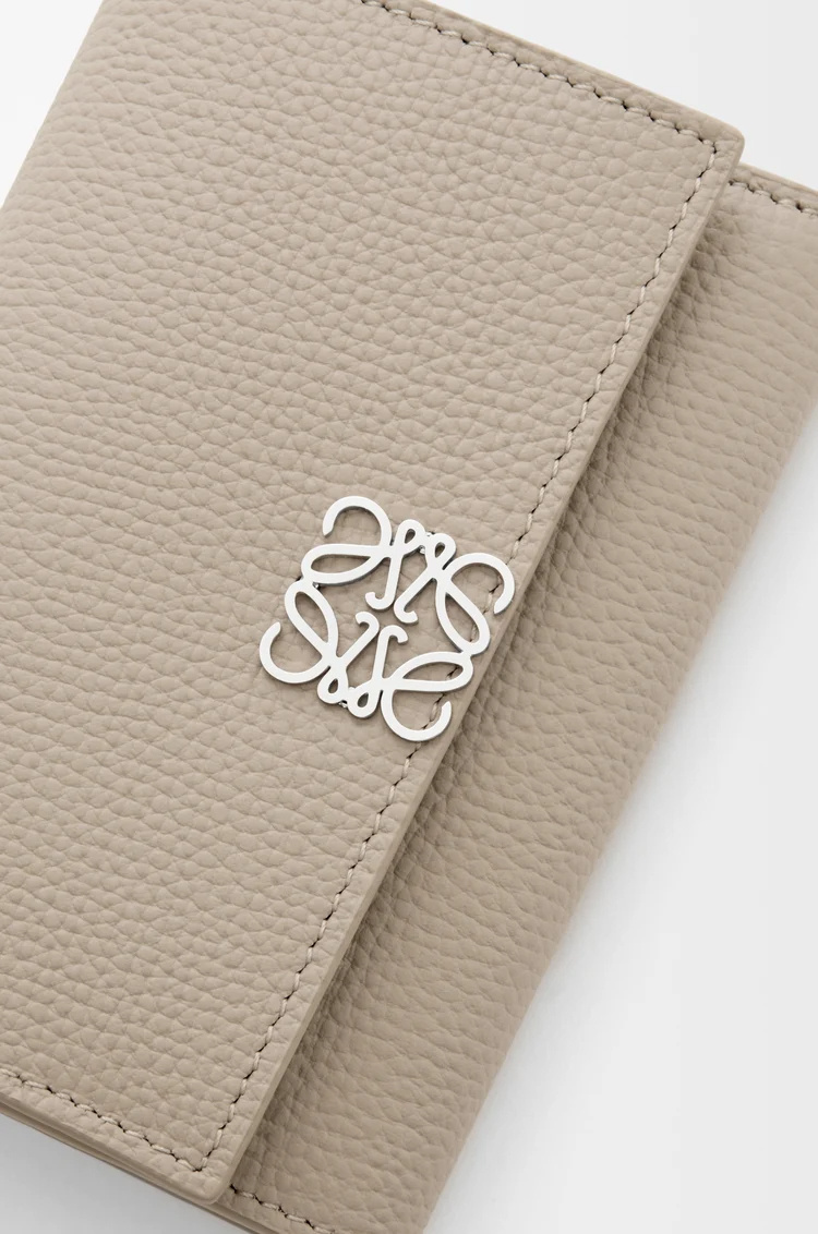 Loewe Anagram Small Vertical Wallet In Pebble Grained Calfskin In Brown