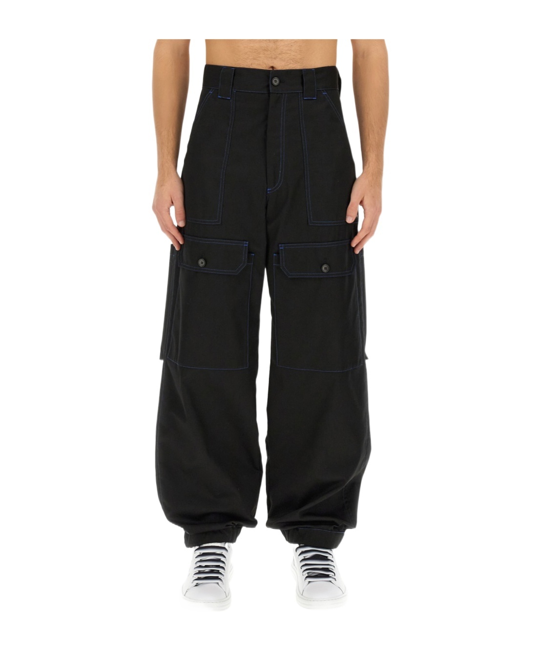 Msgm Contrasting-stitch Logo-patch Trousers In Black