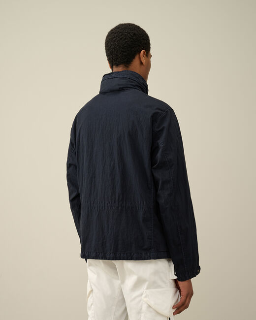 C.p. Company 50 Fili Gum Lens-detailed Jacket In Black