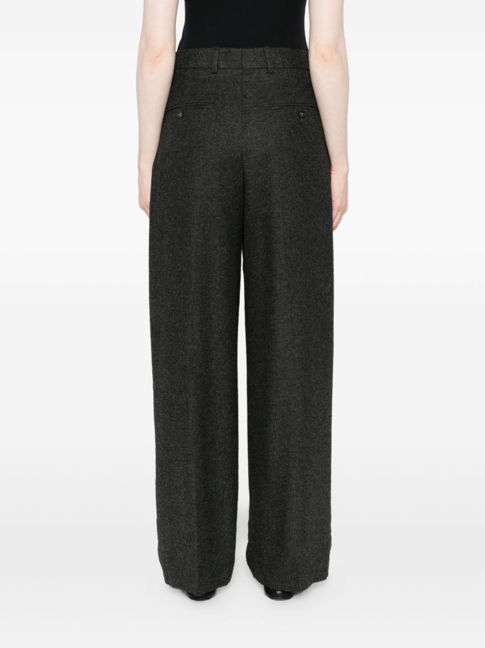 Totême Wide-leg Flannel Trousers Featuring Pockets In Black