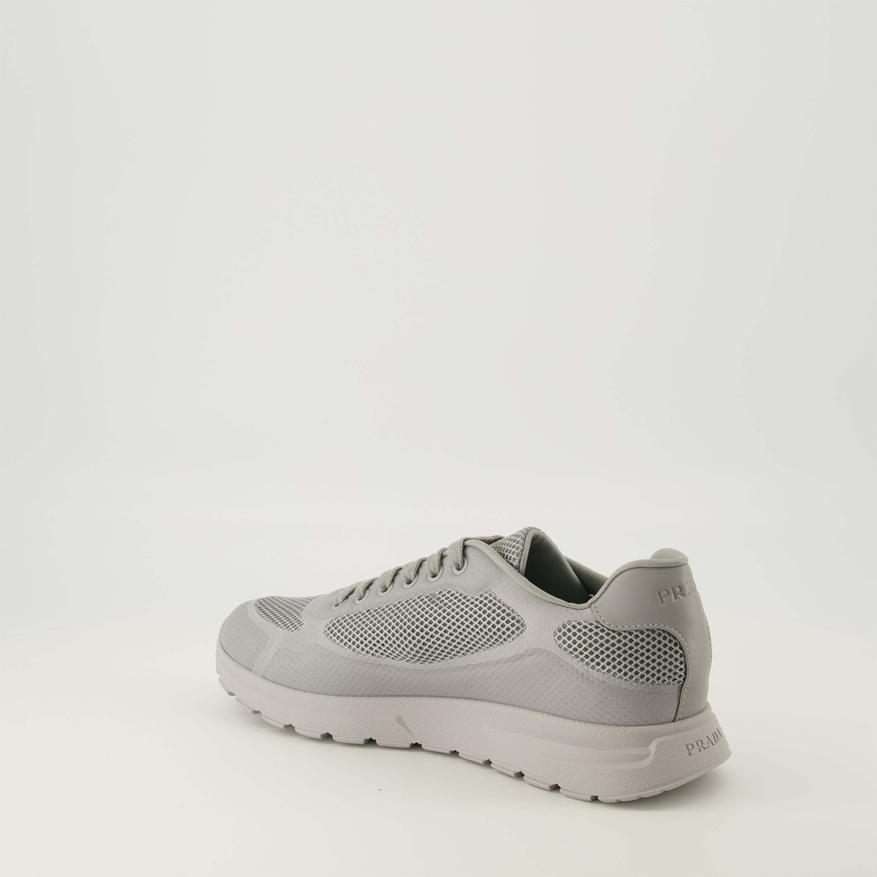 Prada Triangle-logo Lace-up Sneakers In Gray