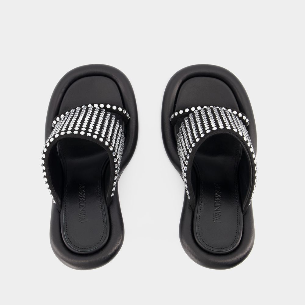 Jw Anderson Bumper-tube Leather Mules In Black