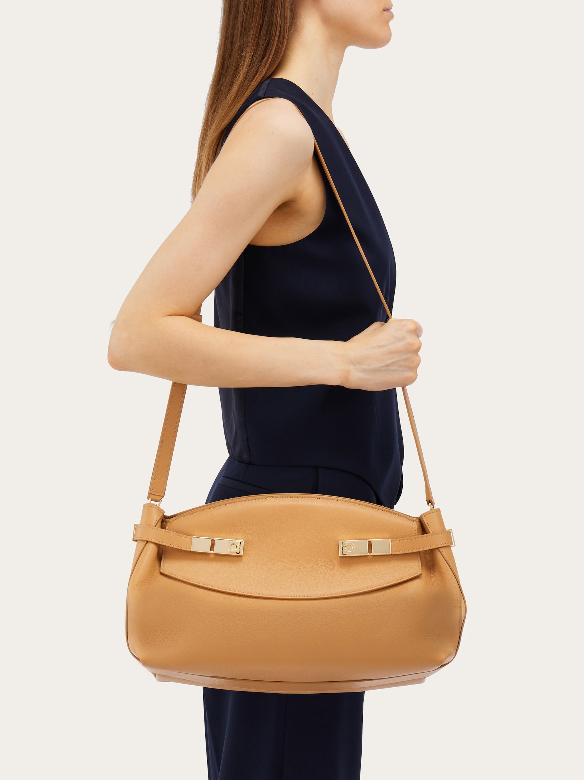 Ferragamo Large Pouch Leather Bag In Nude