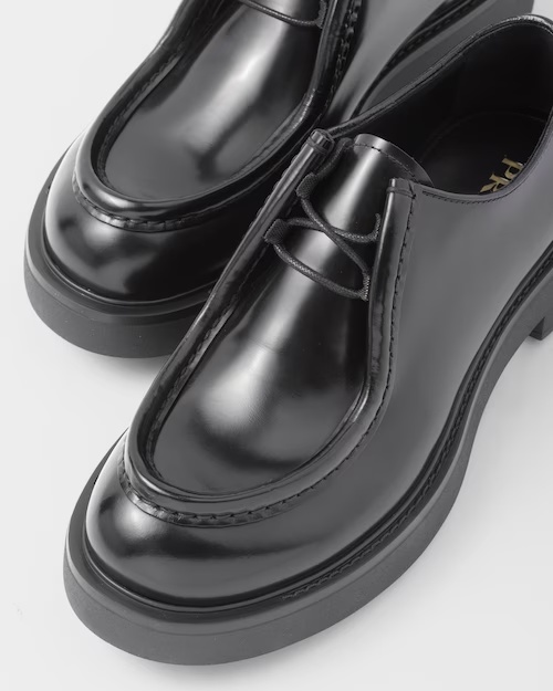 Shop Prada Opaque Brushed Leather Lace-up Shoes In Black