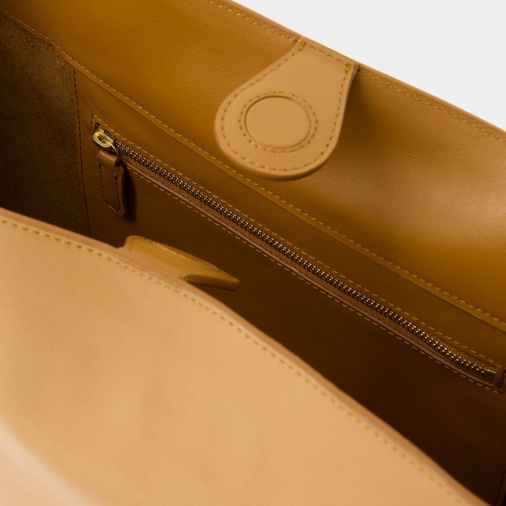 Ines De La Fressange Logo Shoulder Bag In Brown