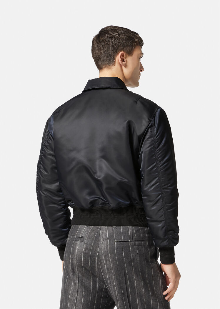 Versace Quilted Zip-up Bomber Jacket With Logo Patch In Black