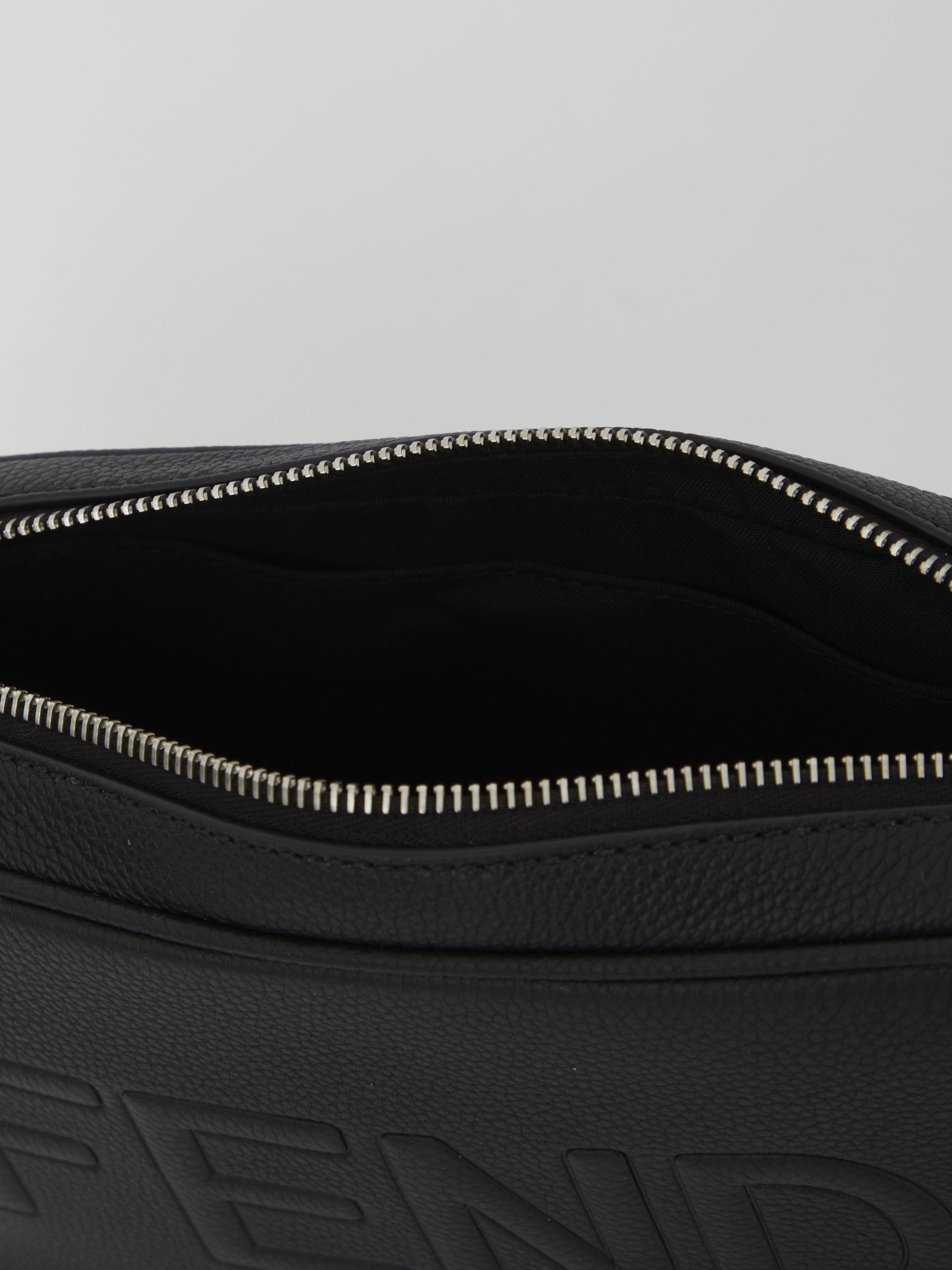 Fendi Embossed-logo Shoulder Bag In Black