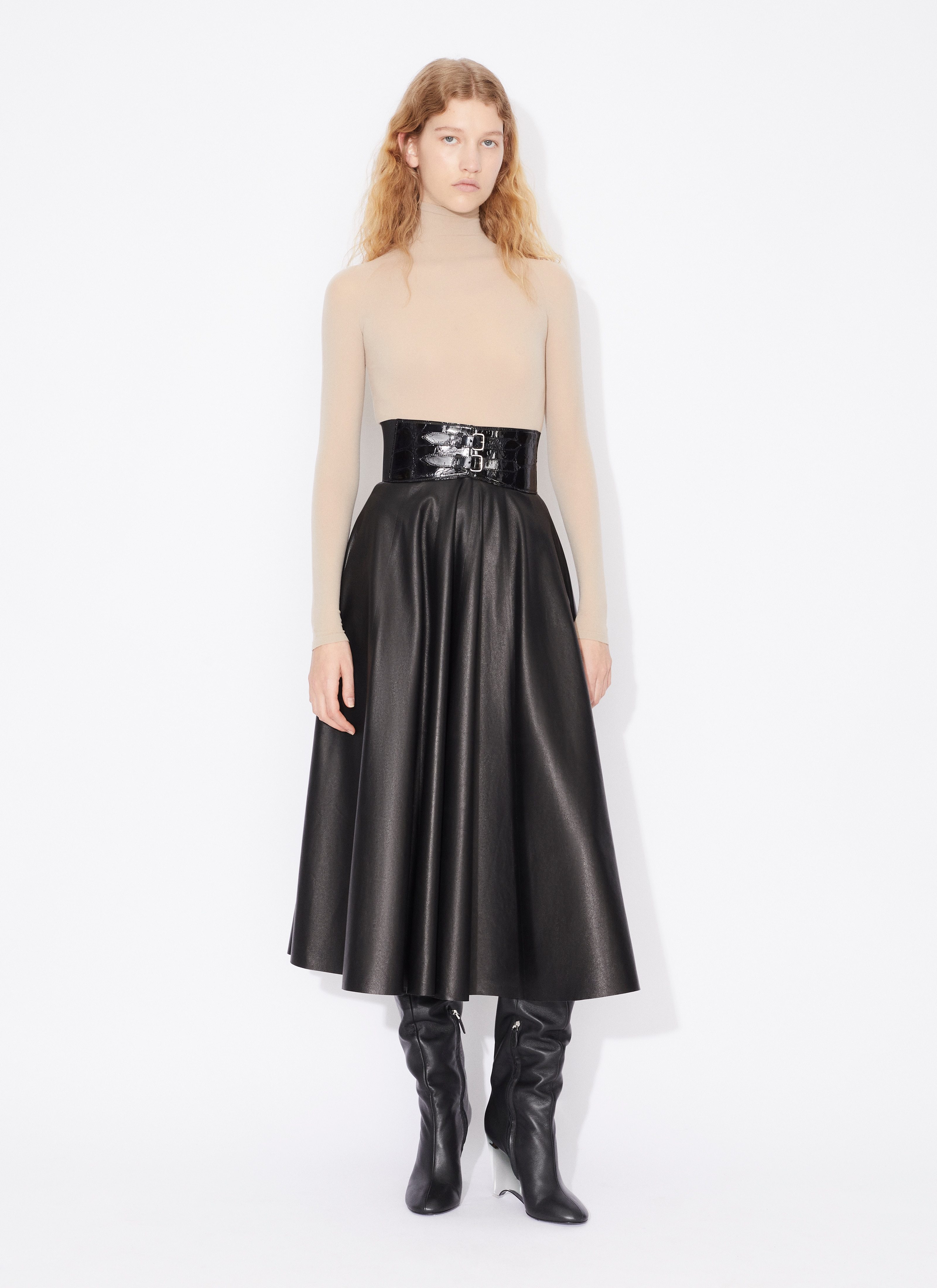 Alaïa Long-sleeved Jumpsuit In Nude