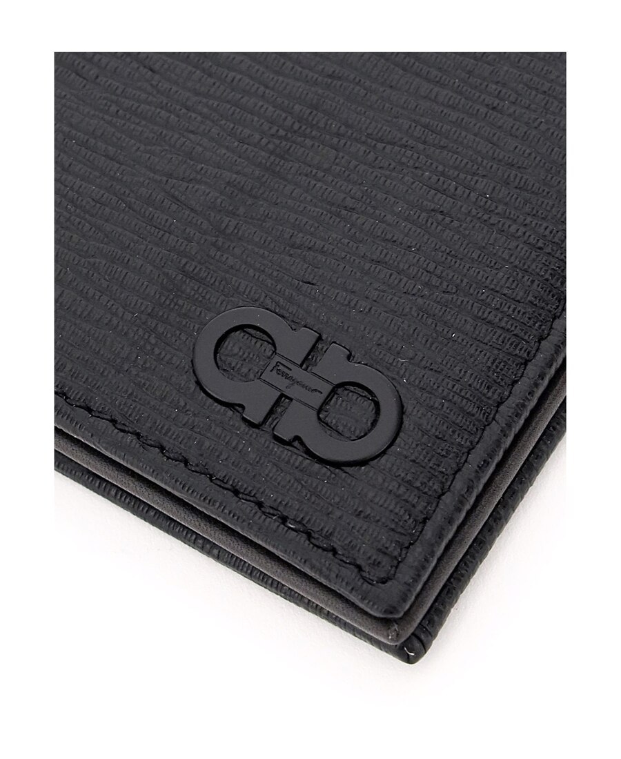 Shop Ferragamo Gancini Bifold Wallet In Black