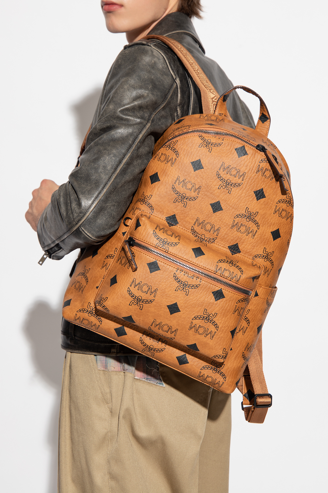 Mcm Logo Backpack In Brown