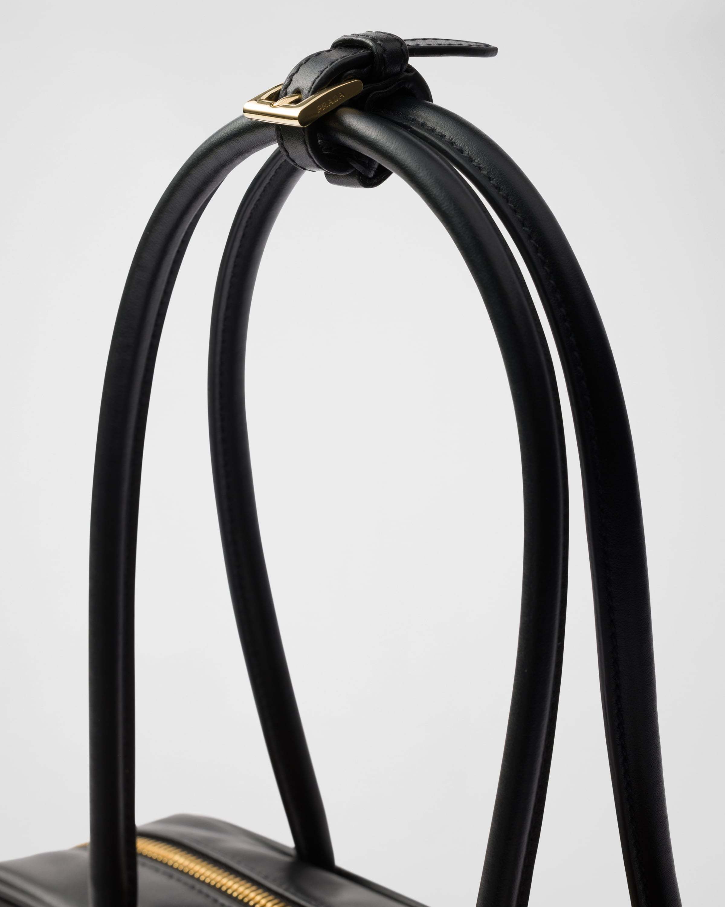 Prada Re-nylon And Leather Small Top-handle Bag With Padlock In Black