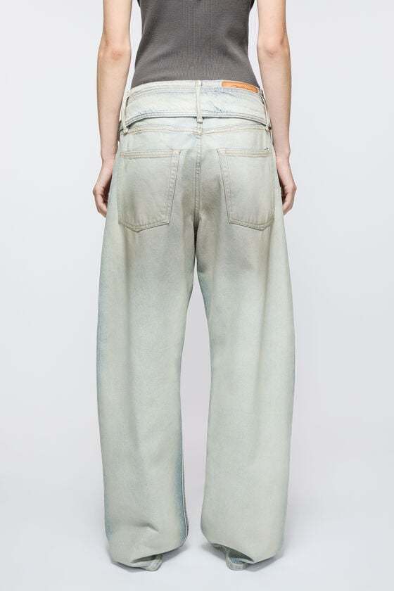Acne Studios Coated Denim Trousers In White